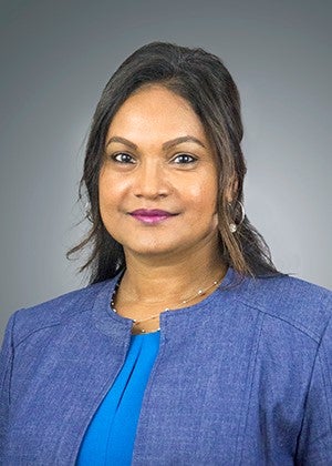 headshot image of Dr. Doolarie Singh-Knights