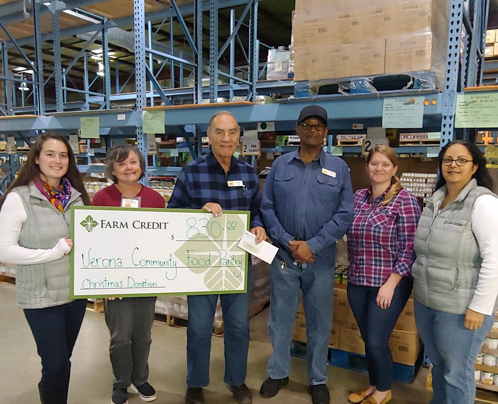 verona community food pantry check presentation farm credit