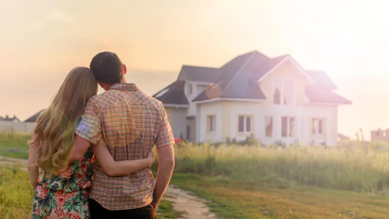 Couple admiring new home purchase