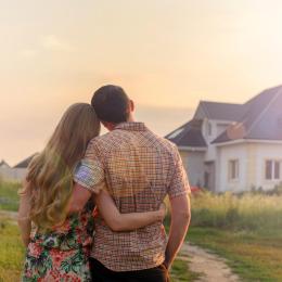 Couple admiring new home purchase